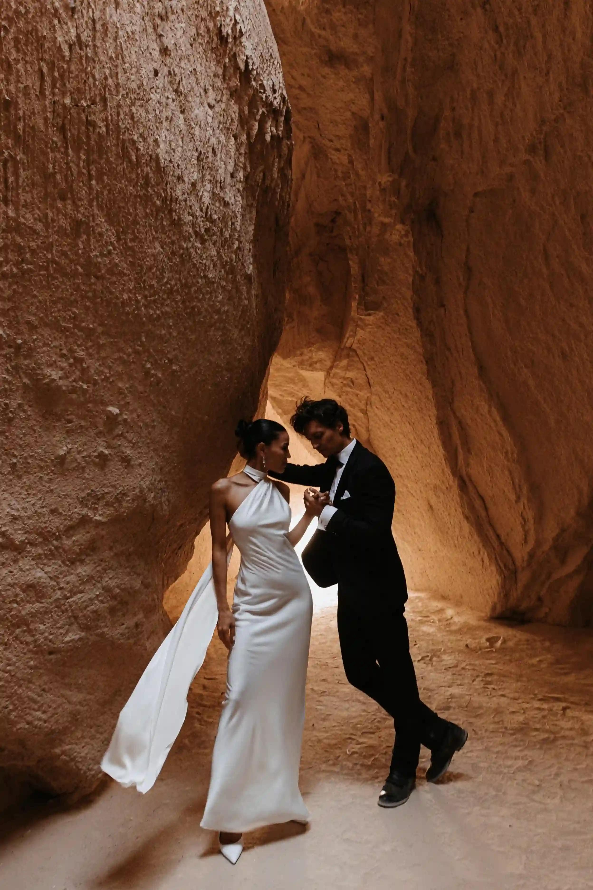 Newlyweds in Cappadocia in a canyon crevice